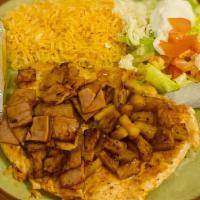 Pollo Hawaiano · Chicken breast topped with ham and pineapple, served with rice, lettuce, tomato, sour cream ...