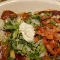 Enchiladas Supreme · Combination of One Chicken, One Beef, One
Cheese & One Bean Enchilada topped with
Cheese, Le...