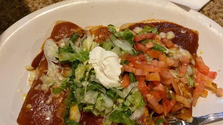 Enchiladas Supreme · Combination of One Chicken, One Beef, One
Cheese & One Bean Enchilada topped with
Cheese, Lettuce, Tomatoes & Sour Cream
Topped with Red Sauce.