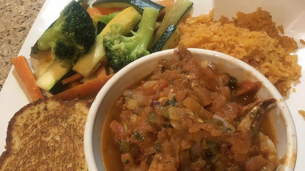 Camarones A La Mexicana · Fresh Shrimp slowly simmered in a Tomato,
Onion & Pepper Sauce with Mexicn Spices;
served with Steamed Vegetables, Mexican Rice & Garlic Bread.