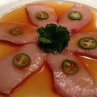 Sashimi Jalapeno (Raw) · Spicy. Tuna and yellowtail sashimi topped with jalapeno with special sauce.