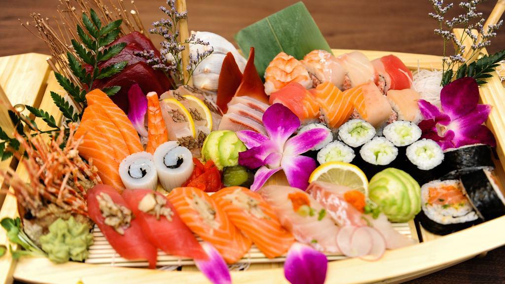 Lover Boat (Raw) · Chef choice 15 pcs sushi, 15 pcs sashimi and two special roll(chef choice).