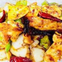 Hot Chili Chicken · Spicy. Moist tender chicken breast with hot chili sauce tossed with red chilies, bell pepper...