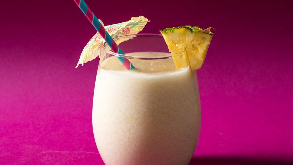 Coconut-Pineapple Smoothie  · A Fresh Blend of Coconut & Pineapple Chunks, Ice and 100% Cane Sugar. No Artificial Ingredients.