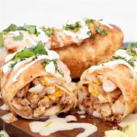 Grilled Chimichanga Dinner · Two Flour Tortillas, Fried or Soft. Stuffed with Grilled Chicken or Steak and Grilled Red Be...