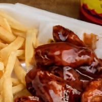 6 Pc Hot Or Honey Bbq Wings · French fries.
