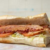 Blt · Mayonnaise, crisp bacon, ripe tomatoes, and crispy lettuce on a toasted roll.