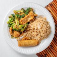 Steamed Chicken Broccoli · With white rice.