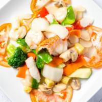S 2. Seafood Delight · Shrimp, scallop, crabmeat and lobster with vegetables in white sauce