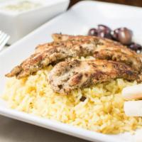 Marinated Chicken · Marinated grilled chicken served atop rice pilaf, with your choice of house or tabbouleh sal...