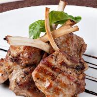 Grilled Lamb Chops · basmati rice, barberry saffron sauce, mint glaze, grilled peppers & tomato ( you can sub pot...