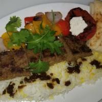 Ground Lamb & Beef Kabob On Rice · Basmati rice, barberry saffron sauce, grilled tomato ( you can sub potato wedges for rice).