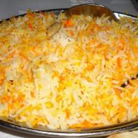 Side Rice · Basmati rice with barberry butter sauce.