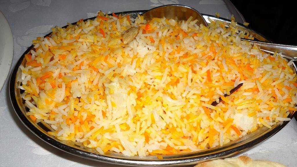 Side Rice · Basmati rice with barberry butter sauce.
