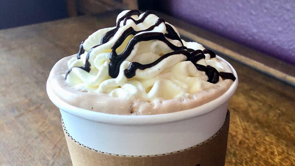 Dark Chocolate Mocha · With house-made chocolate syrup featuring Belgian cocoa.  For an extra layer of flavor, have it topped with our Vanilla Bean Whipped Cream.  16 ounces.
