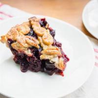 Brandied Cherry Pie · A cherry pie refashioned with the addition of dried cherries and star anise, this pie will b...