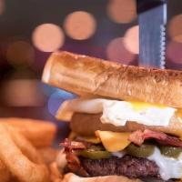 Jimmy Burger · Swiss and American cheese, bacon, jalapenos, grilled onions, onion ring and a fried egg on T...