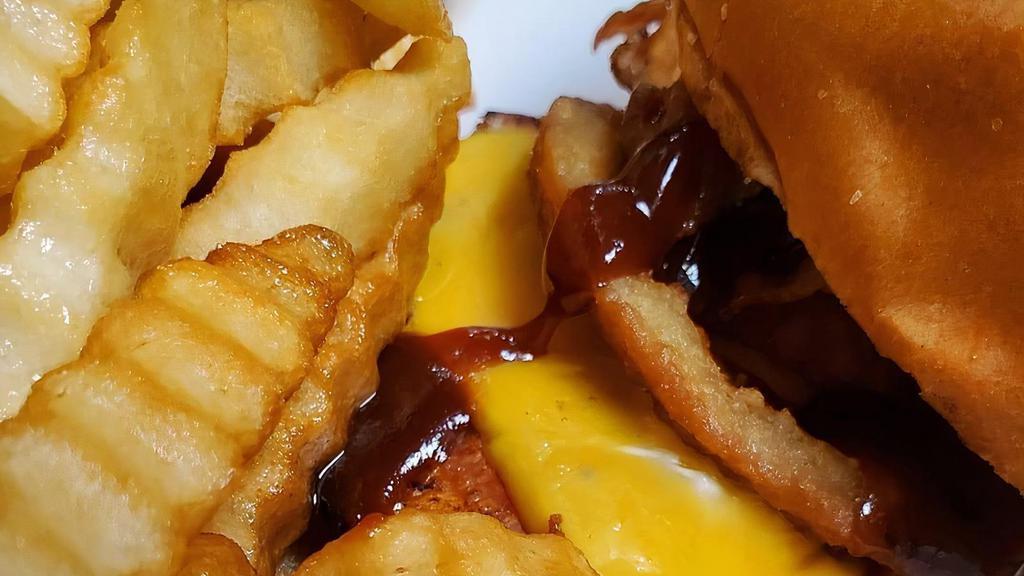 Southwest Burger · Swiss and American cheese, bacon, jalapenos, onion ring, and bbq sauce. Beef can be substituted for Chicken. Please Specify if so.