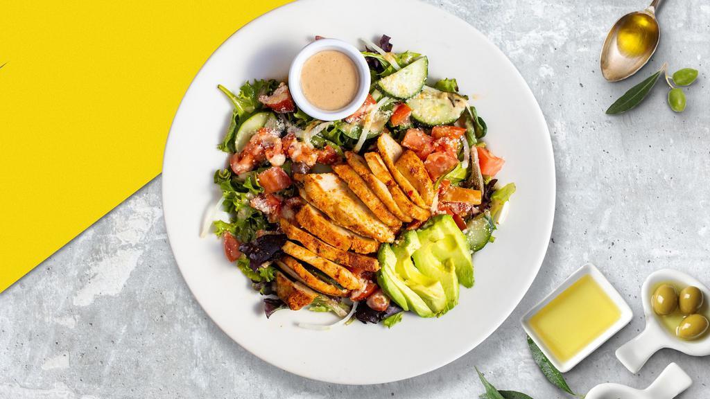 Chicken Salad · Fresh green lettuce mix, tomatoes, onion, green peppers, black and green olives and cheese with grilled chicken marinated with a combination of Greek and Italian. Topped with parmesan cheese.