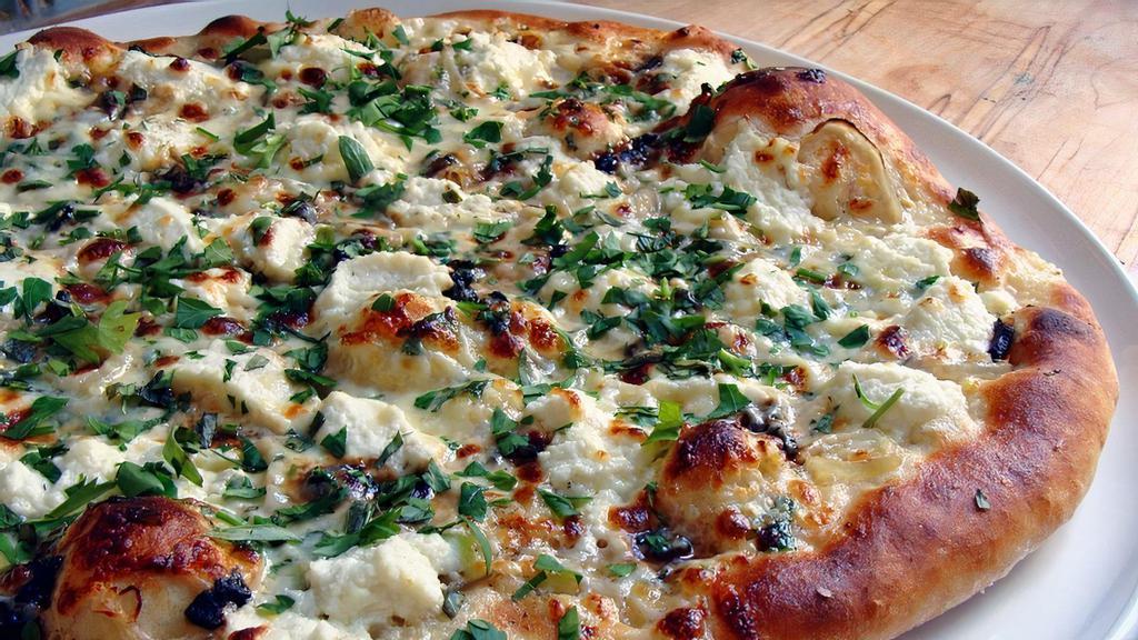 White Pizza · Mozzarella cheese, fresh garlic, ricotta cheese, fresh basil,extra virgin  olive oil and parmesan cheese.