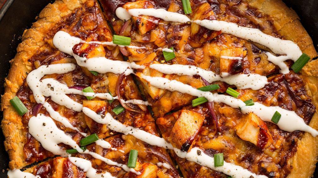Chicken Bbq Pizza · Mozzarella cheese, marinated  crispy chicken, onions, fresh garlic and topped with BBQ sauce and bluecheese dressing.