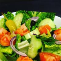 Garden Salad · Romaine lettuce,tomatoes,red onions,black olives,cucumbers,pepperoncicnis