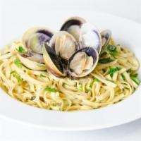 Linguine With Clams · Made with real Clam shells and your choice of white or red clam sauce.