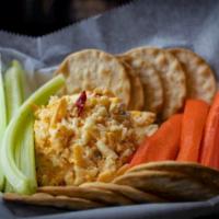 Cold Pimpin' · Homemade pimento cheese served cold with crackers, celery, and carrots