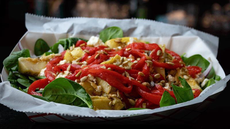 Spinach Salad · Fresh spinach, roasted red peppers, feta cheese, artichokes, & sunflower seeds