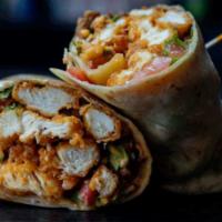 Buffalo Chicken Wrap · Served fried or grilled, tossed in buffalo sauce, spicy ranch, lettuce, tomato, cheddar chee...