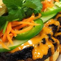 Spicy Asian Bbq Brisket Banh Mi · Smoked brisket topped with a spicy Asian bbq sauce