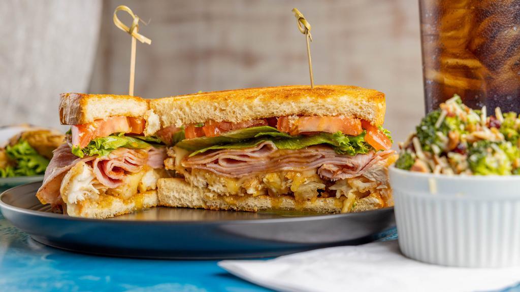 Transom (Cordon Bleu) · Grilled brioche toast topped with fried chicken, sliced ham, Swiss cheese, lettuce, tomato and sweet spicy house mustard.