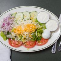 Chef Salad · Chef salad sliced ham and smoked turkey with cheese, sliced egg, tomatoes, cucumbers and oni...