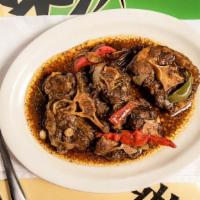 Oxtail · A Caribbean favorite tender braised oxtail seasoned with a variety of herbs and spies then s...