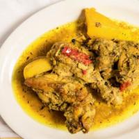 Curry Chicken · Pieces of curry drenched chicken on the bone with cg delights blend and simmered with potato...