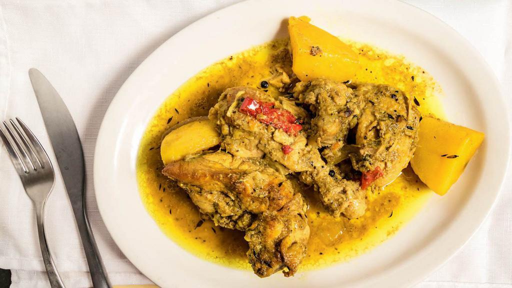 Curry Chicken · Pieces of curry drenched chicken on the bone with cg delights blend and simmered with potato in a Jamaican curry sauce.
