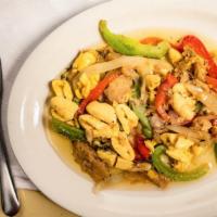Ackee & Cod Fish · Jamaica national dish! Ackee sautéed with codfish, scotch bonnet pepper, tomatoes, red, gree...