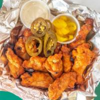 Wings (10Pc) · Dozen backed 
Mild / hot 
Side ranch or blue cheese