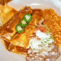 Create Your Own Deluxe Combo · Pick two entrée items and salsa choice. Served with Mexican rice and refried beans. The pull...