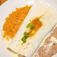Dos Amigos Burrito · Two ground beef burritos topped with salsa ranchera and queso blanco. Served with Mexican ri...