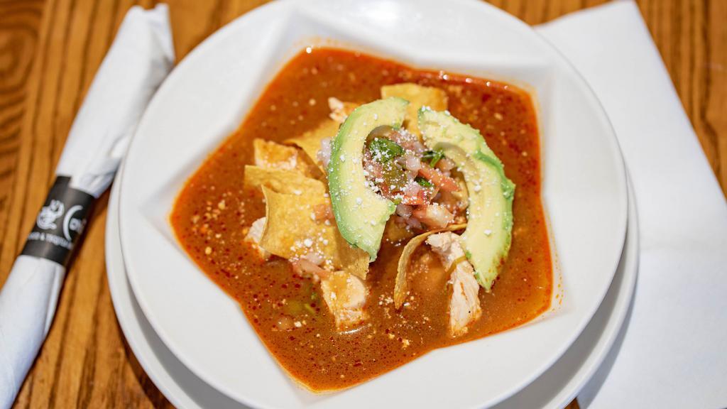 Sopa Azteca · Traditional chicken soup served with tortilla strips, pico de gallo, avocado and fresh Mexican cheese.