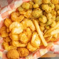 Shrimp Basket · 12 jumbo shrimp served with two hushpuppies and two sides of your choice