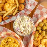 Shrimp & Oyster Basket · 6 jumbo shrimp and 5 fried oysters with two sides of your choice and two hush puppies