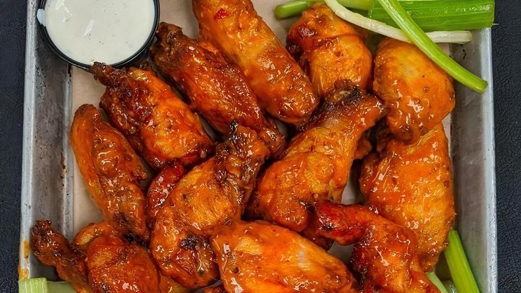 10 Wings · 10 crispy fried jumbo wings tossed in your favorite sauce with celery & blue cheese or ranch.