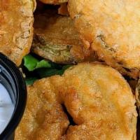 Fried Pickles · Southern fried pickle chips served with buttermilk ranch dressing.