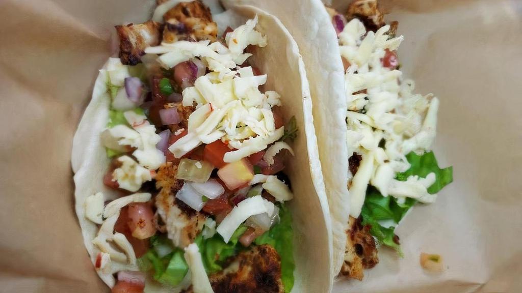 Blackened Chicken Tacos · Blackened chicken with pepper jack cheese, lettuce, pico de gallo & chipotle ranch.