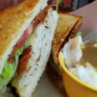 Smoked Turkey Blt · Our delicious house-smoked turkey, shaved and served on Texas toast with melted Swiss, crisp...