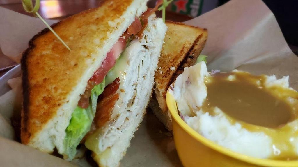 Smoked Turkey Blt · Our delicious house-smoked turkey, shaved and served on Texas toast with melted Swiss, crispy bacon, lettuce & tomato.