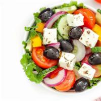 Greek Salad · House Salad with crumbled feta, served with greek vinaigrette on the side.