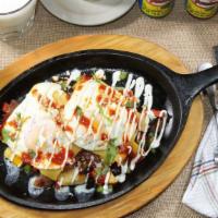 Chicken Enchiladas · Three enchiladas, with grilled chicken, topped with green sauce, cheese dip, sour cream, and...